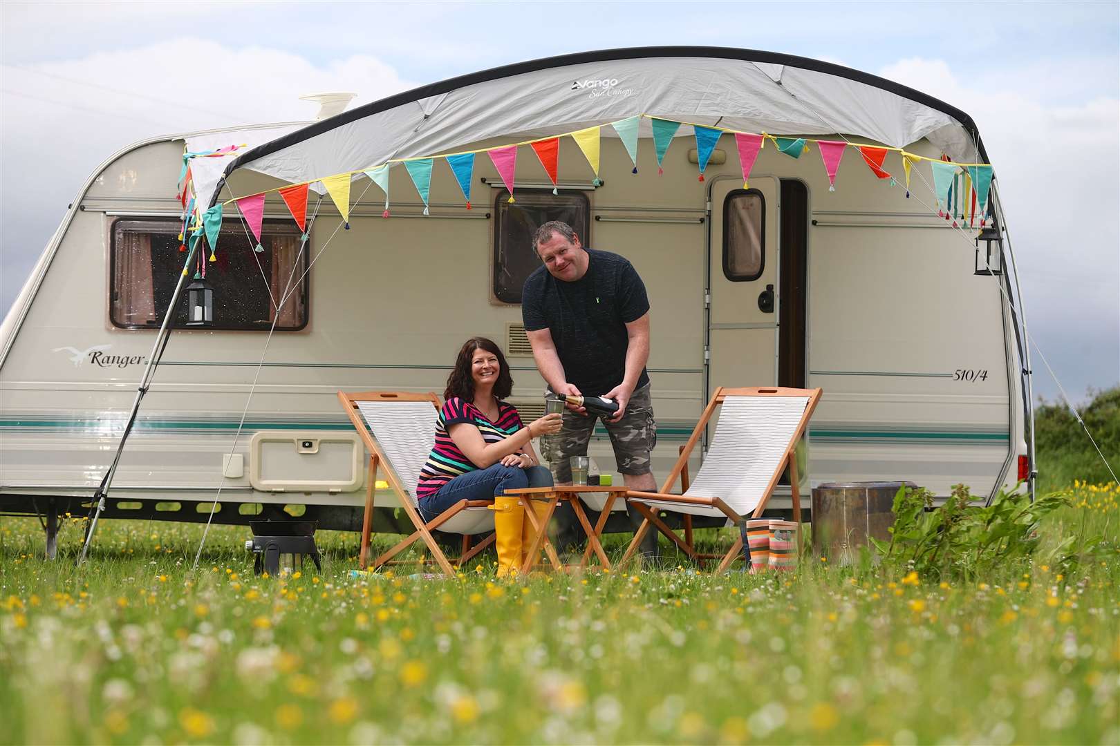Stephen Webster and Arran Taylor spent some of their £1m Lotto prize on a second-hand caravan (Martin Bennett/Camelot/PA)