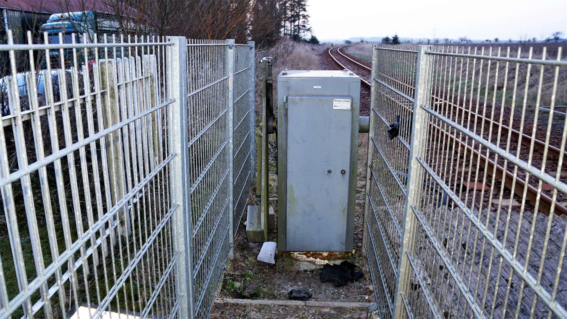Damage to barrier at Watten level crossing. The arm became detached from this control box due to the high winds. Picture: DGS
