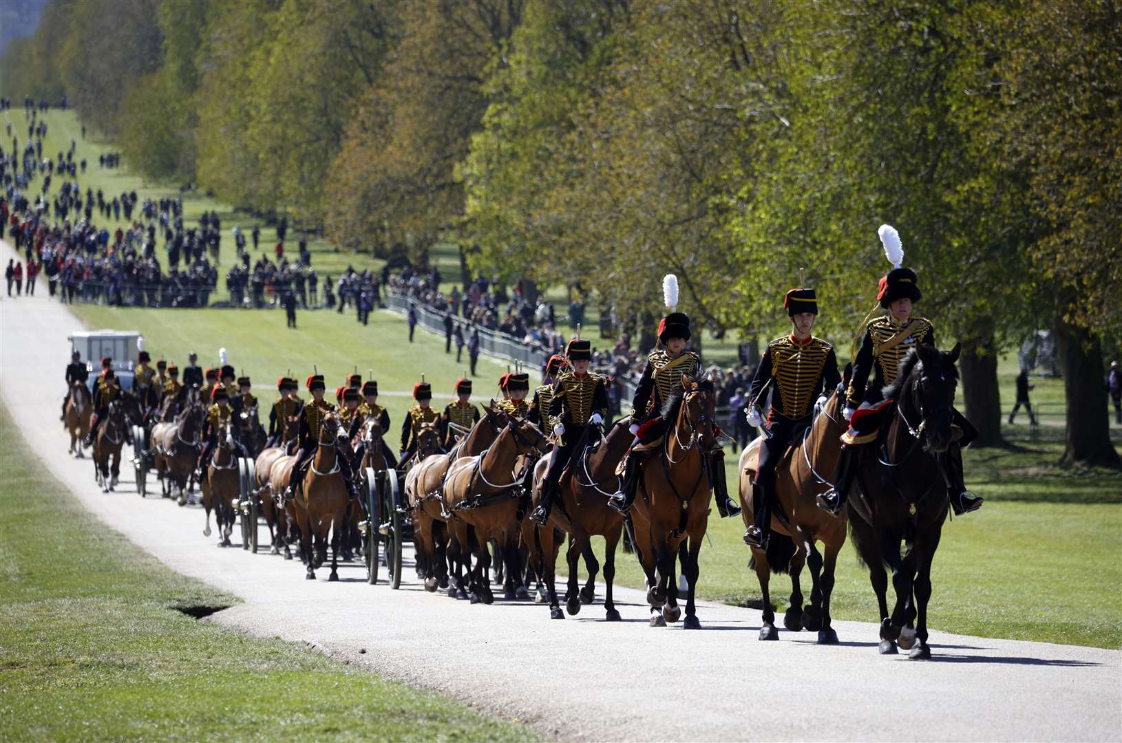 King’s Troop Royal Horse Artillery make their way up The Long Walk (Phil Noble/PA)