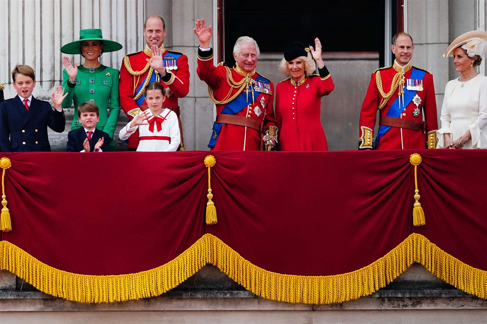 Members of the royal family on the balcony of Buckingham Palace, London, to view the flypast following the Trooping the Colour