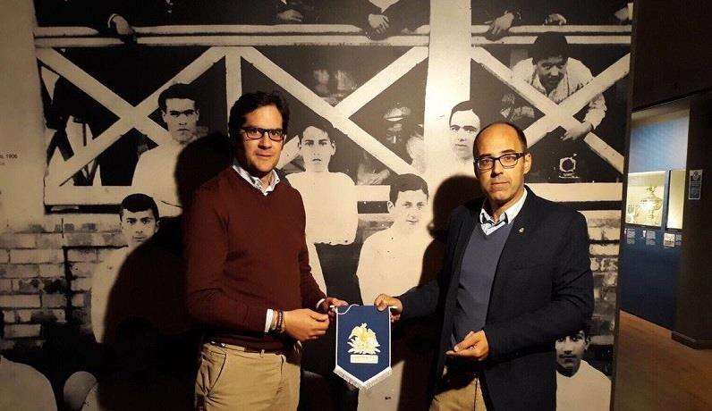 Recre manager Carlos Hita with club official Alejandro López, who received the Lybster FC pennant when he visited the village in the summer. It is on display in the Huelva club museum. Picture: Recreativo de Huelva