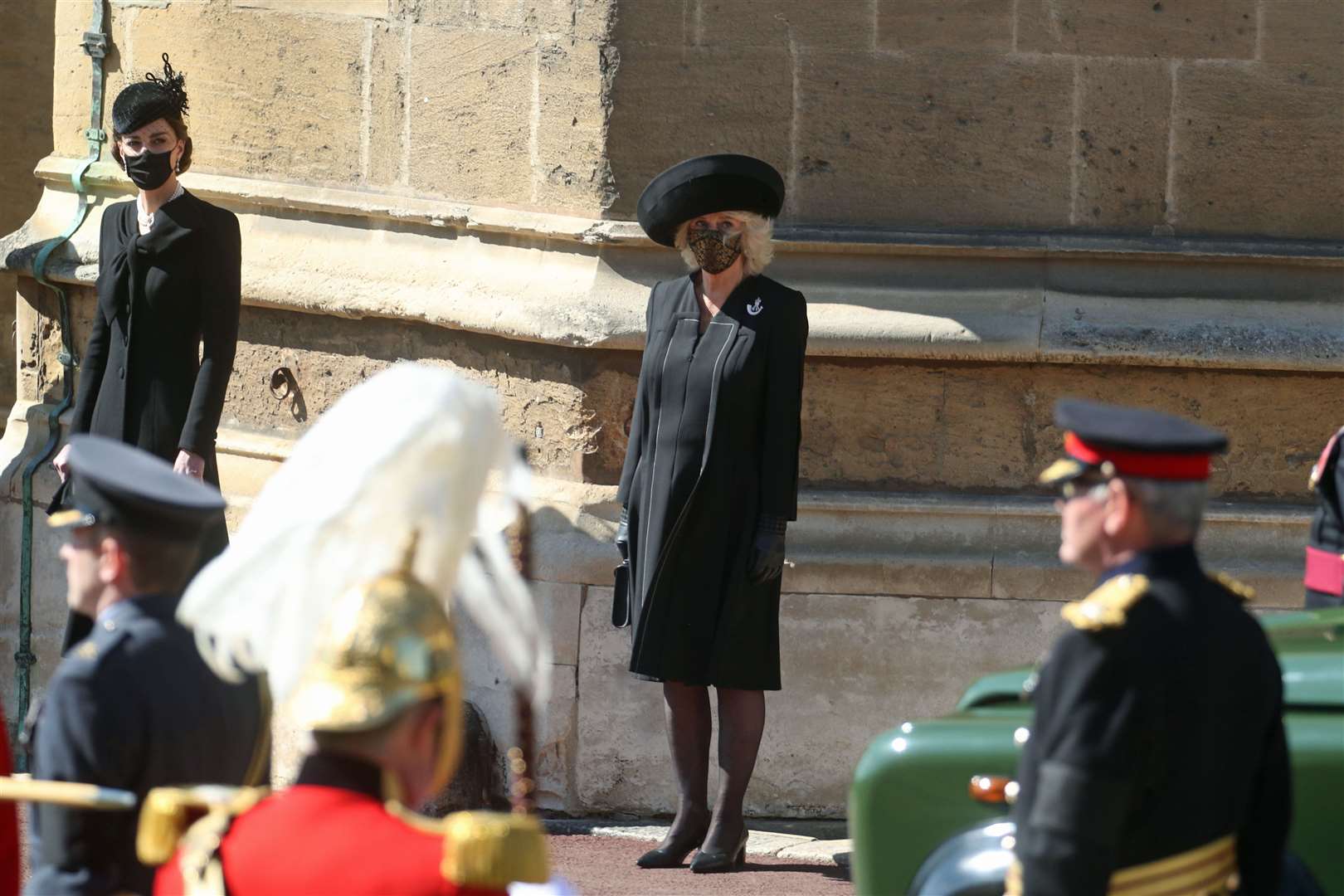 The Duchess of Cambridge and the Duchess of Cornwall watching the procession at the Galilee Porch of St George’s Chapel, Windsor Castle, during the funeral of the Duke of Edinburgh (Steve Parsons/PA)
