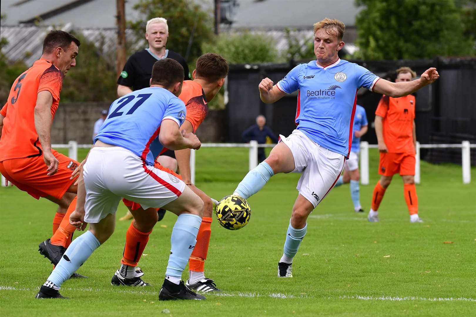 Wick's Mark Macadie beats Callum Haspell to the ball during the match against Rothes in August in which Macadie suffered an arm injury. Picture: Mel Roger