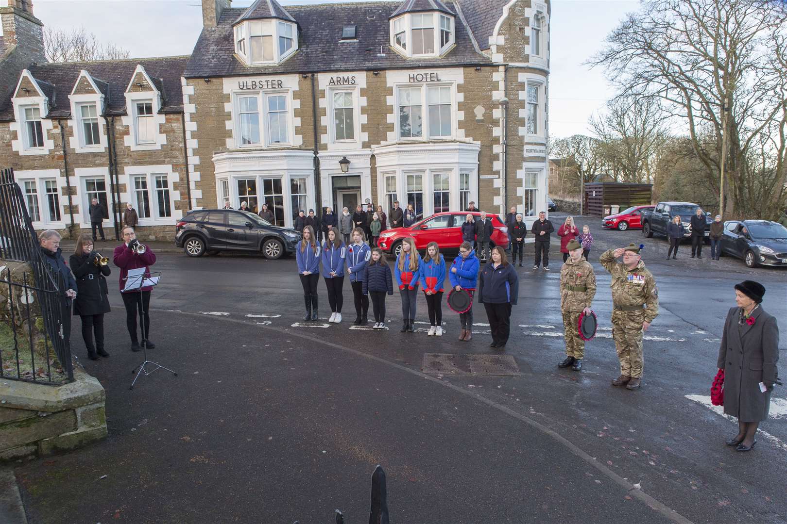 Deputy Lord Lieutenant Gillian Coghill, (right), along with representatives of the Guides and Army Cadet Force wait to lay Poppy Wreaths on the Halkirk War Memorial, on Sunday morning. Photo:Robert MacDonald/Northern Studios