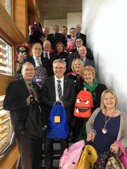 Rob Gibson MSP (front left) with his colleagues and the backpacks collected for Mary’s Meals.
