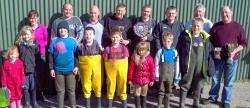 Some of the model yacht owners (back row) who took part in the inter-county competition seen with some of the youngsters who helped out. The owners are: from left – Louise Sinclair, Kevin Paterson, Archie Miller, Willie Thomson, Donald McWilliam, Ian Kirkness, Bill Drever, Alan Walls.