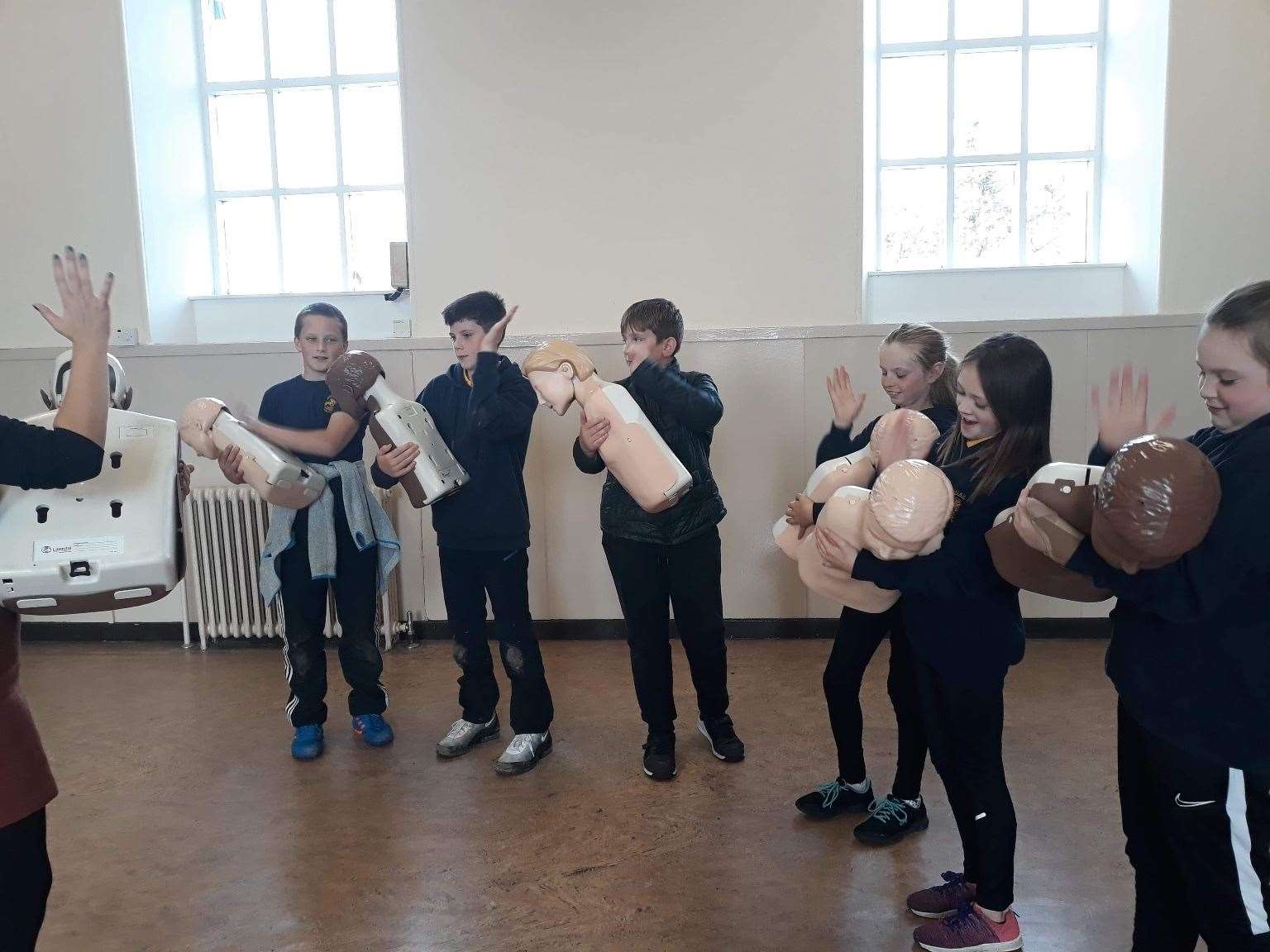 Pupils learned from HiMATS staff how to deal with a choking situation.