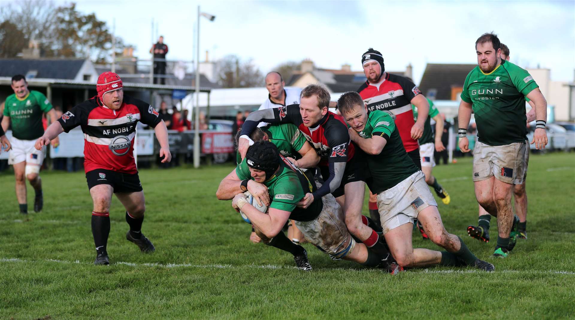 Kevin Budge bulldozes his way over the try line to score for Caithness. Picture: James Gunn