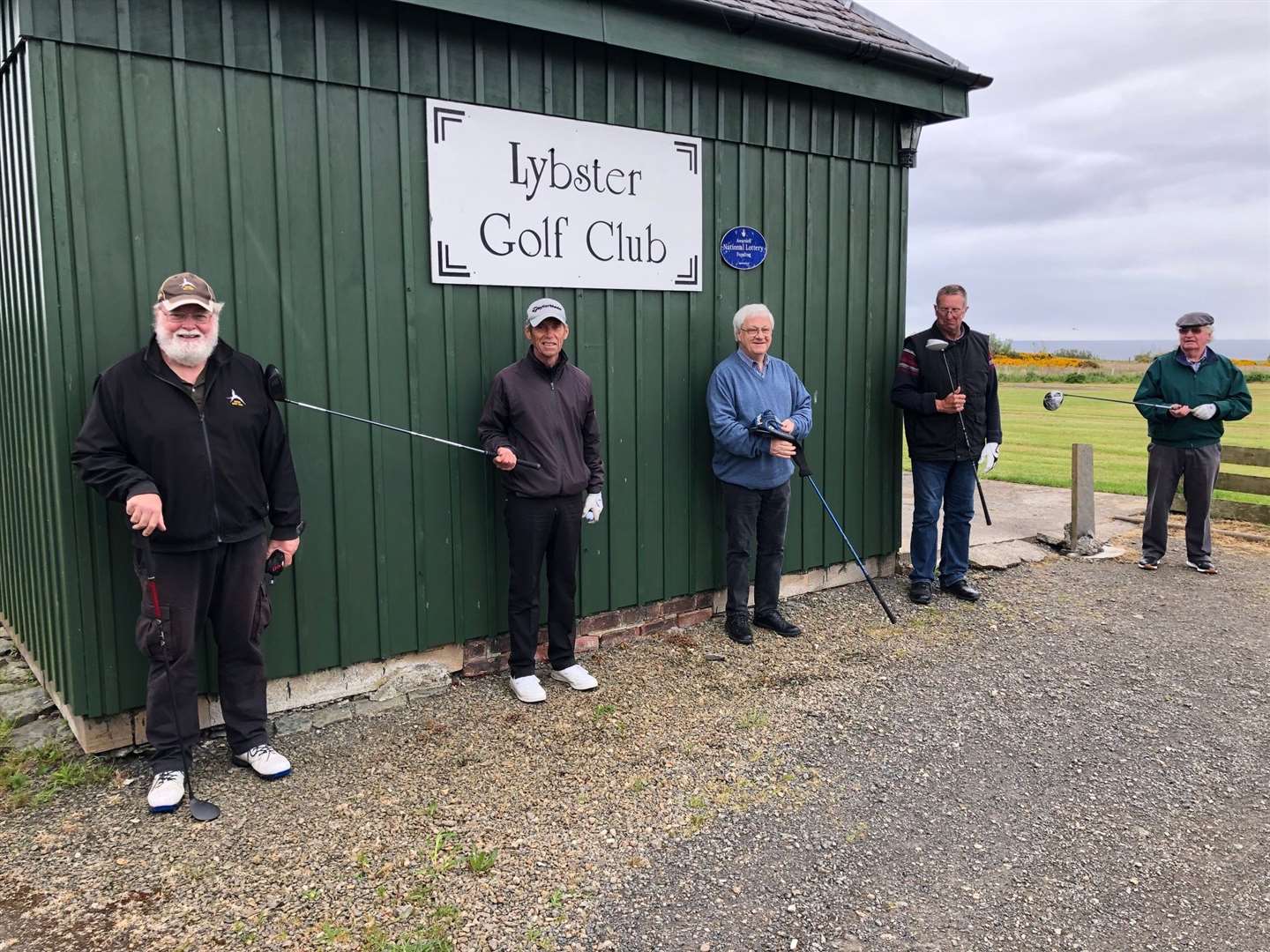 Some of the golfers who took part in the first Stableford competition to be held this season at Lybster Golf Club line up for a socially distanced photo outside the clubhouse. Pictured (from left) are Bill Macintosh, Peter Knapp, James Baillie, Murray Smythe and Mike Browne. Picture: John Gunn