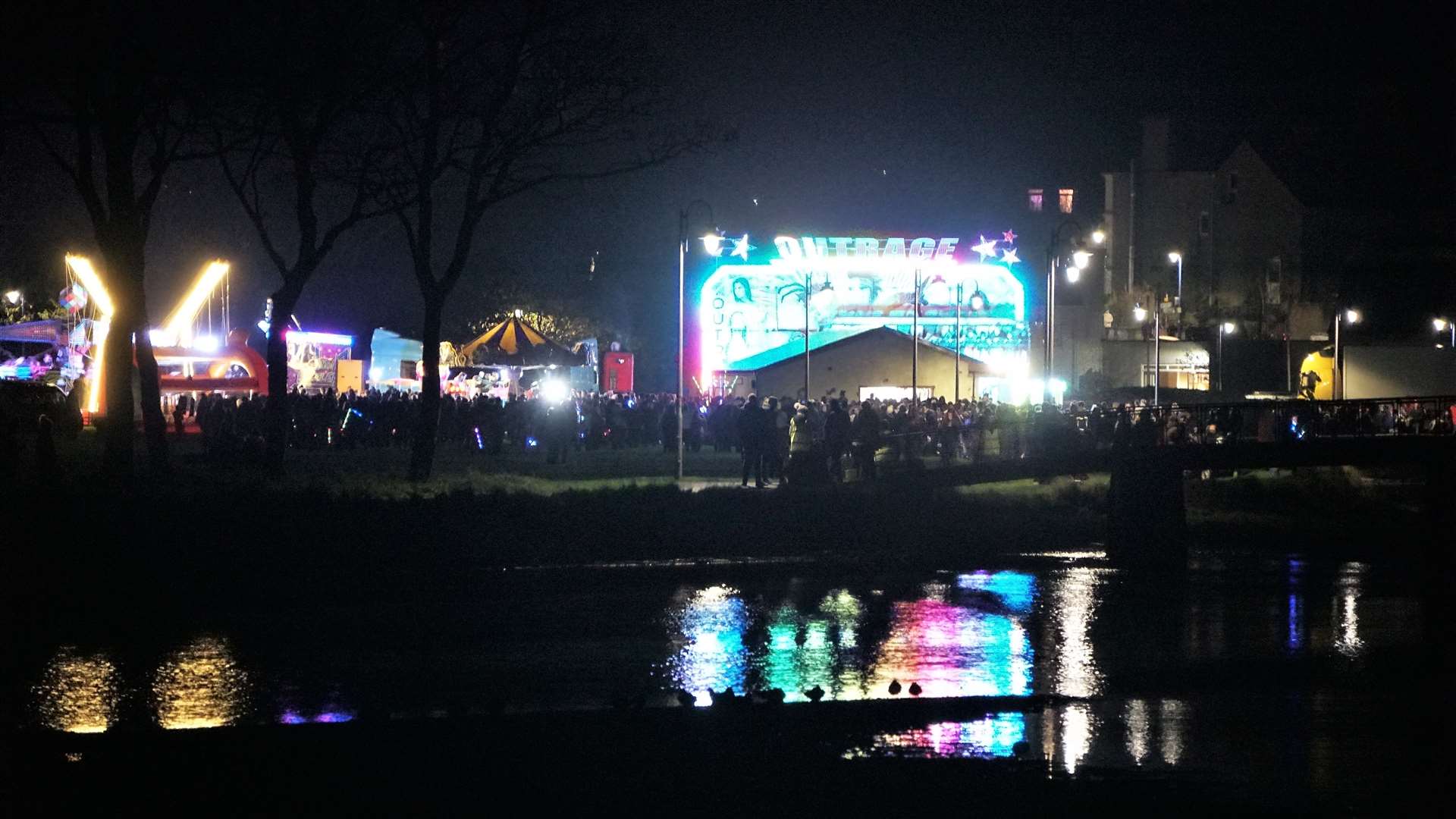 Many wait in anticipation at the side of Wick river for the special fireworks display on Saturday night. Hercher's sideshows provided extra fun for those attending the event. Picture: DGS