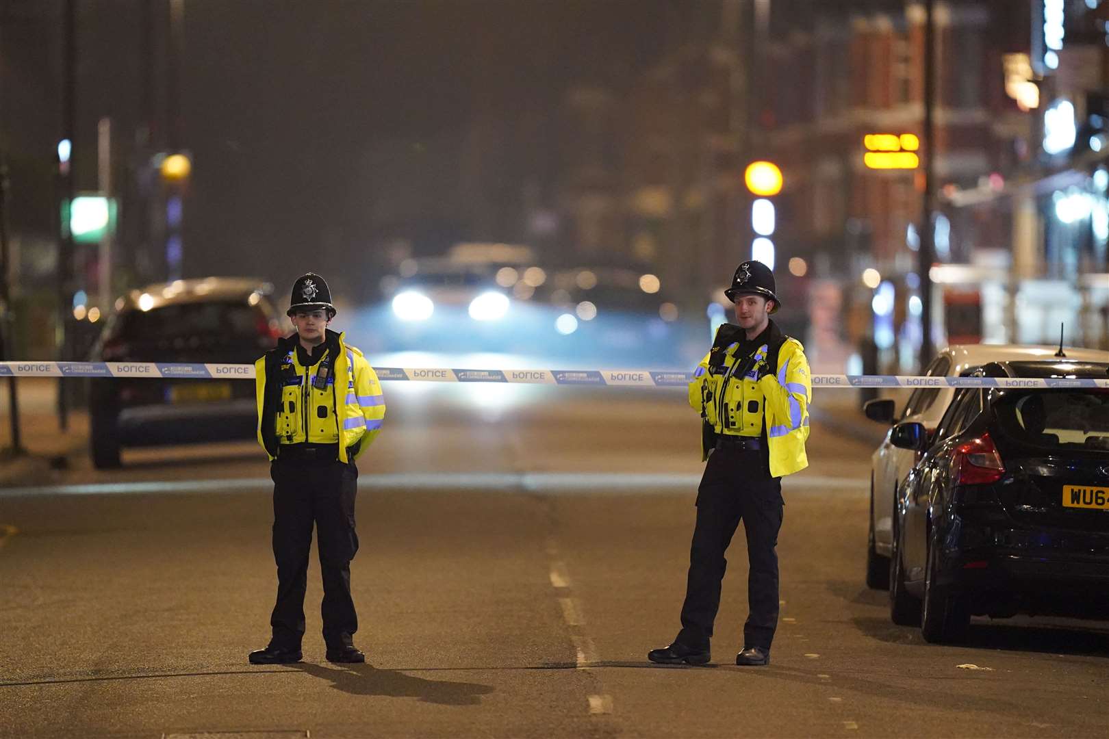 Police at a cordon near the scene in January last year (Jacob King/PA)