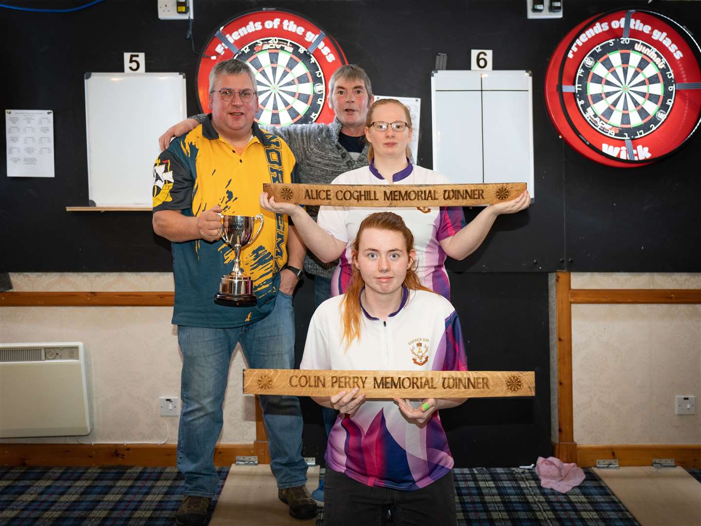 The Wick and District Darts League's Alison Tait, Sandy Mackay and Richie Taylor.