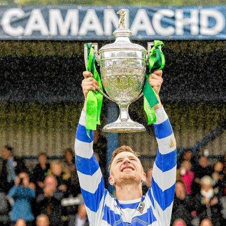 Newtonmore captain Andy Mackintosh lifting the Camanachd Cup last weekend. Picture: Neil Paterson