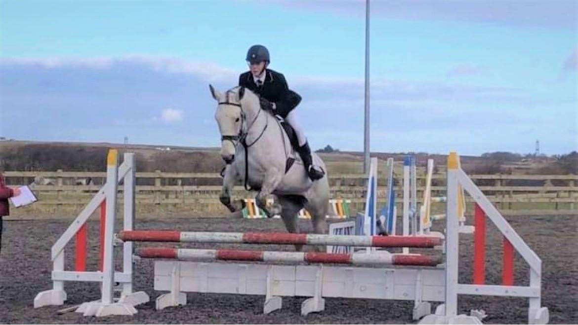 Liam Mackenzie and Stroma taking part in the showjumping phase of the combined training.