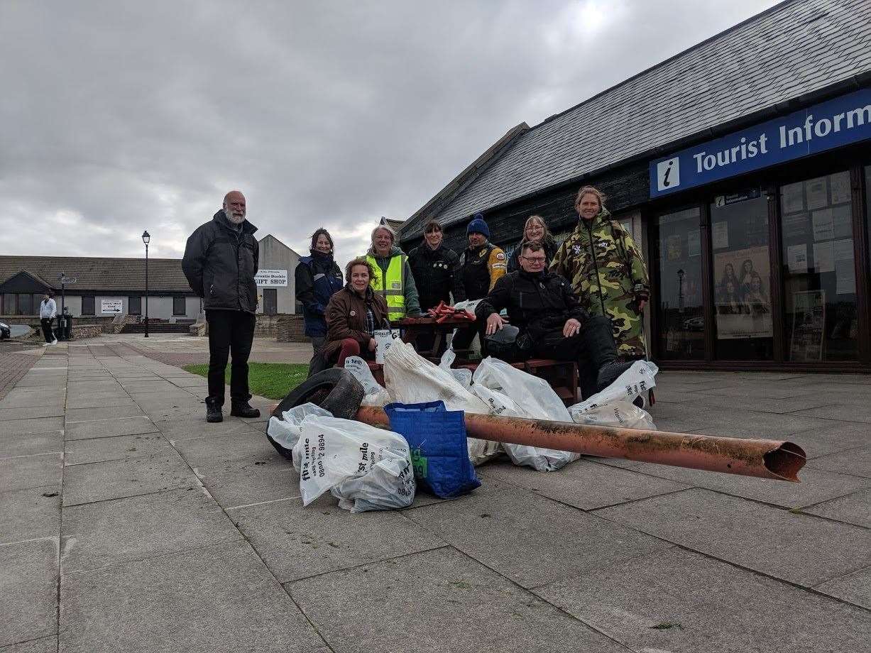 The volunteers who took part in the beach clean at John O'Groats along with the 67kg of rubbish they collected
