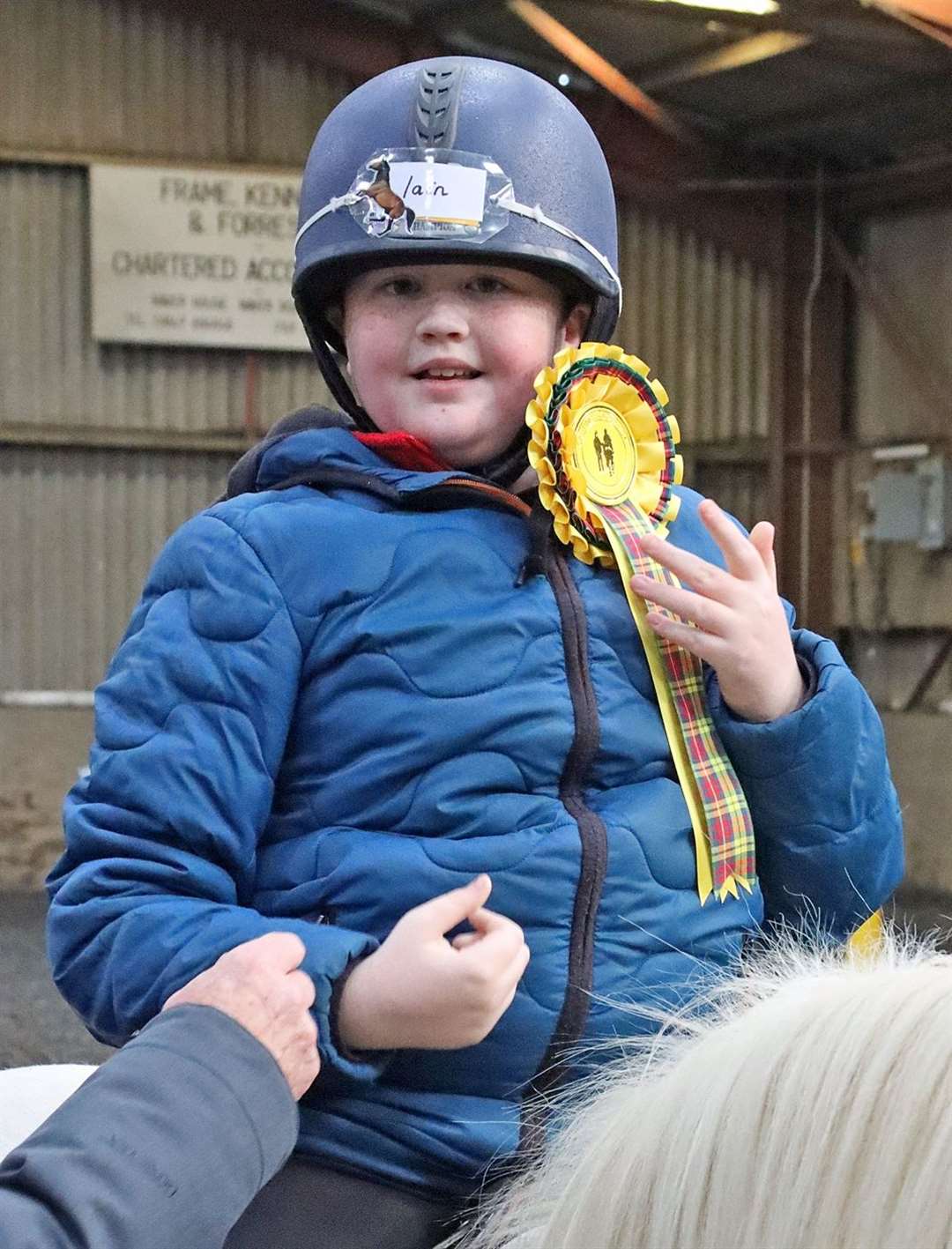 Iain Dunbar showing off his rosette. Picture: Neil Buchan