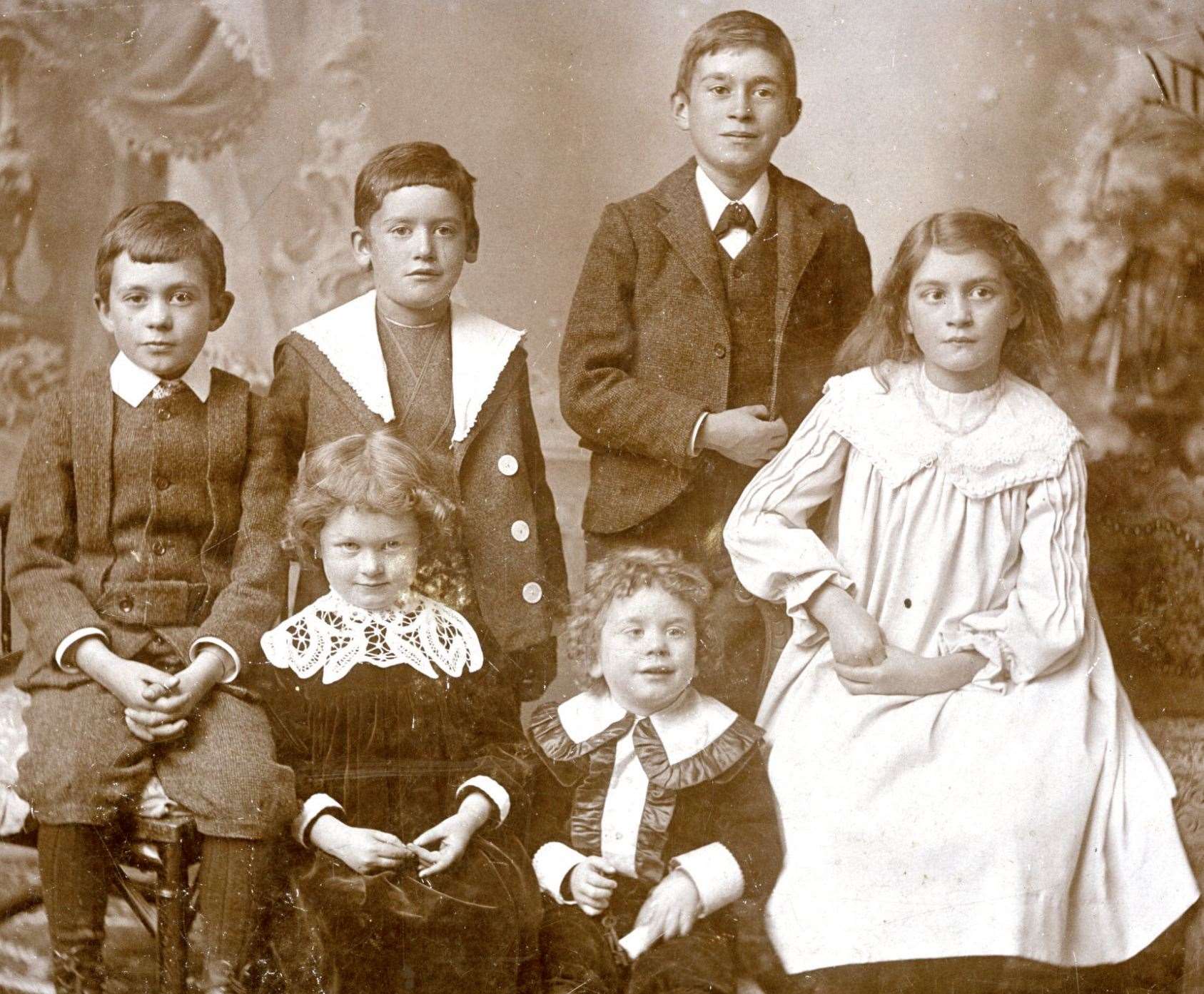 The Coghill family in their Sunday best, as seen in one of the photo books for sale.