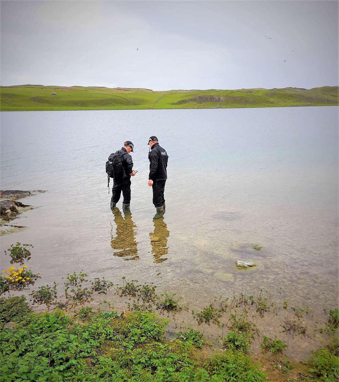 Officers recovering the broken eggs from the Loch.