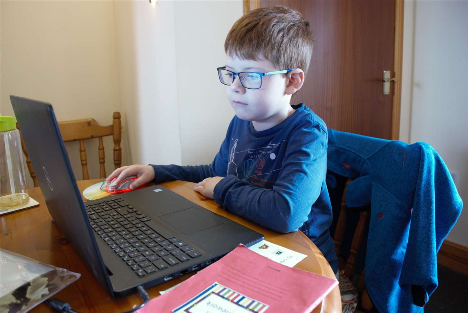 Ten-year-old Arran Macleod hard at work at home.
