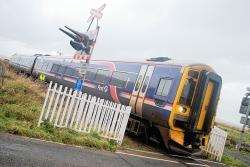 Three people were killed at the Halkirk level crossing.