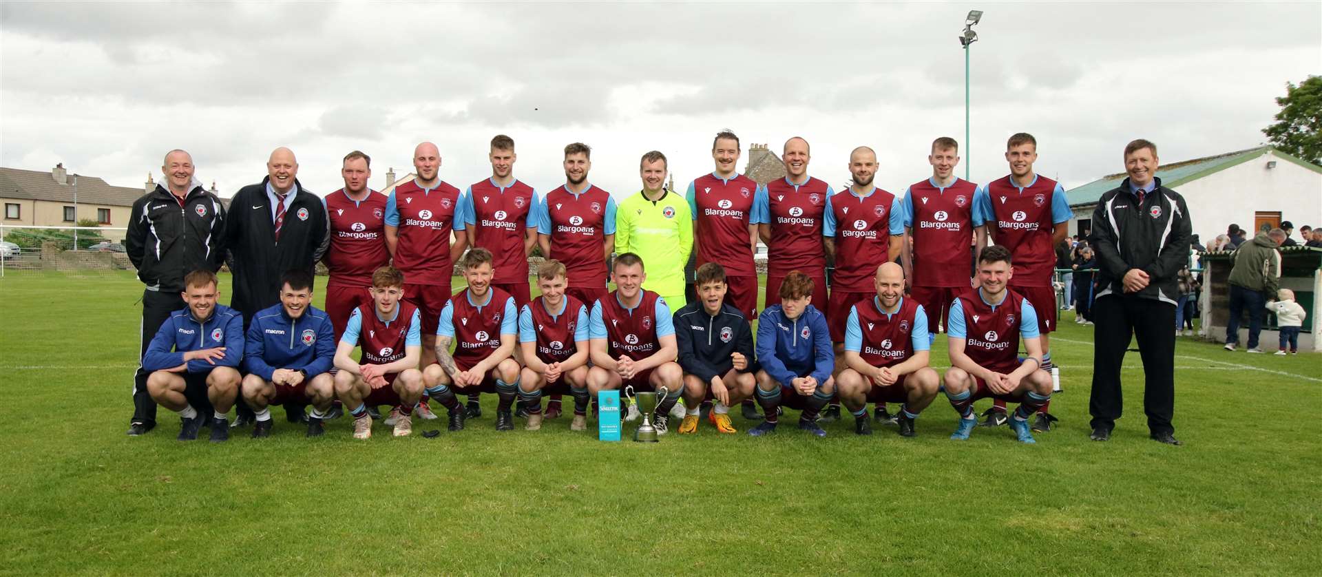 Pentland United players and officials after winning the Colin Macleod Memorial Cup in Castletown on Saturday. Picture: James Gunn