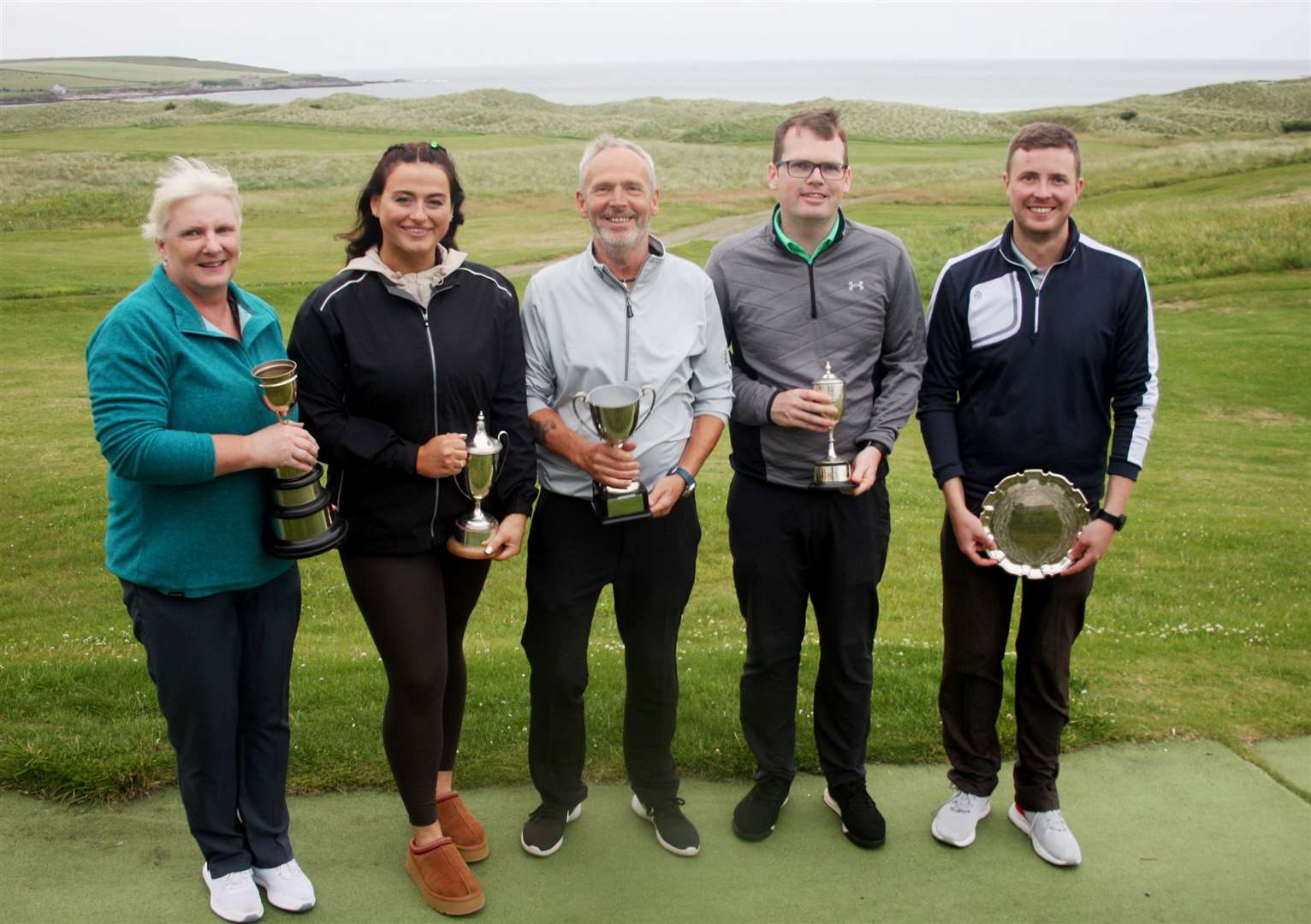 Prizewinners from club championships finals night – (from left) Pauline Craig, ladies' handicap; Eleanor Tunn, ladies' scratch; Donald Mowat, gents' seniors; Brent Munro, gents' scratch; and Lee Malcolm, gents' handicap.