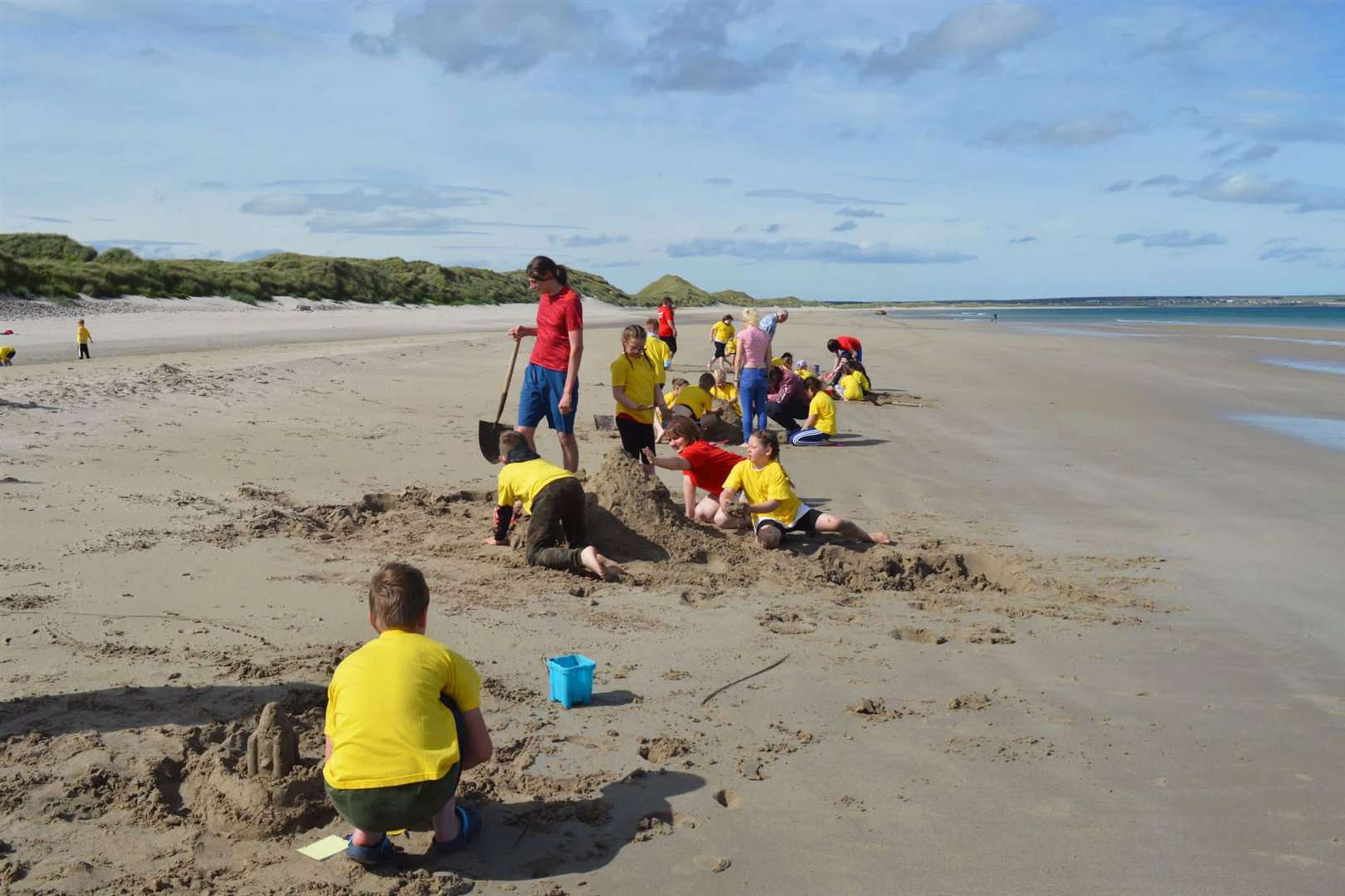 Sand sculptures taking shape during the beach outing in Reiss.