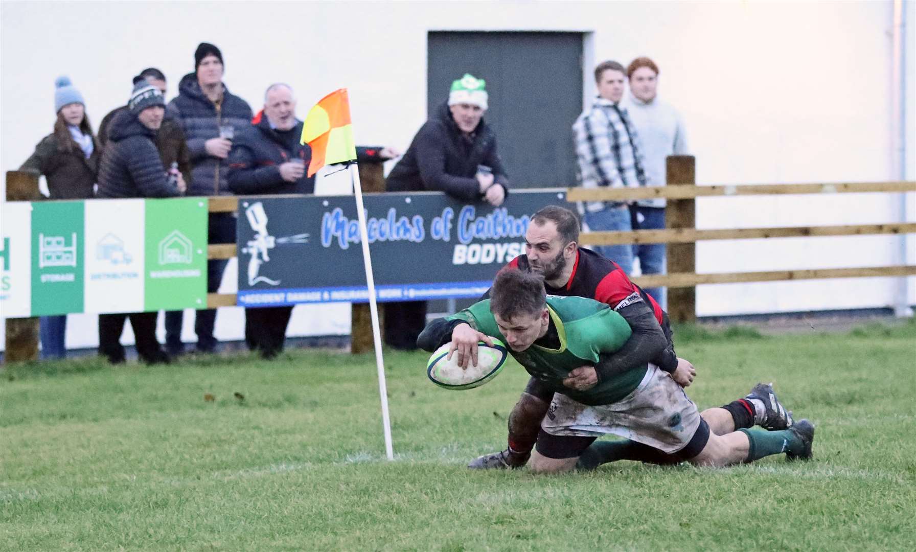 Scott Webster scoring a try in the corner for the Greens against Aberdeenshire in December. Webster has recovered from flu. Picture: James Gunn