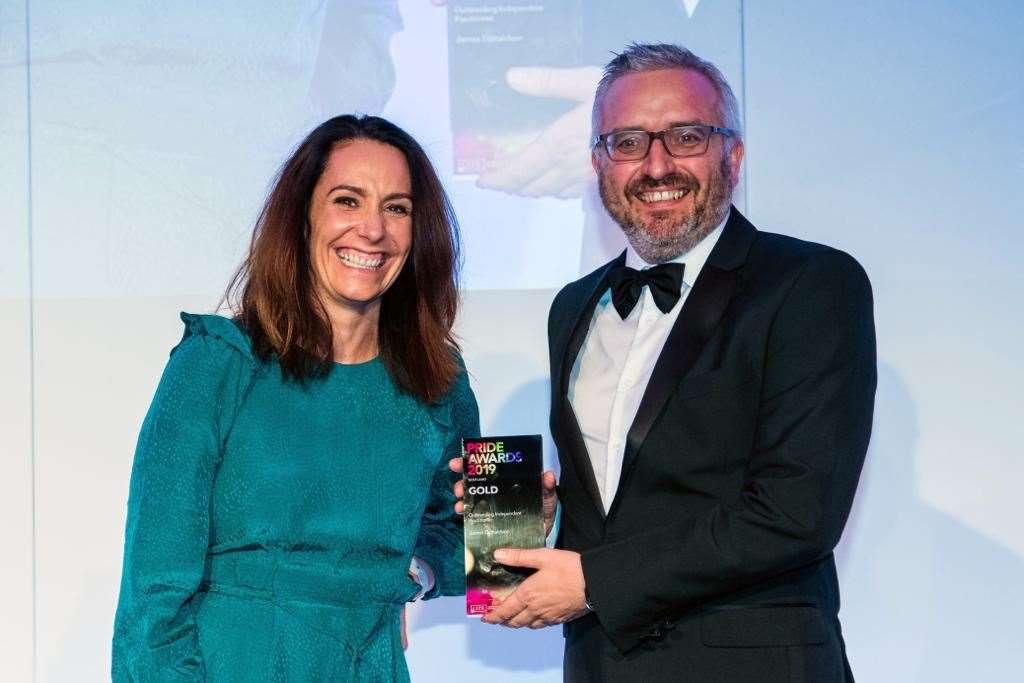 Kirsty Leiper, one of the event judges, presents Engage PR’s James Donaldson with the gold accolade for Outstanding Independent Practitioner at the CIPR Scotland PRide Awards 2019 in Glasgow. Picture: Ian Georgeson