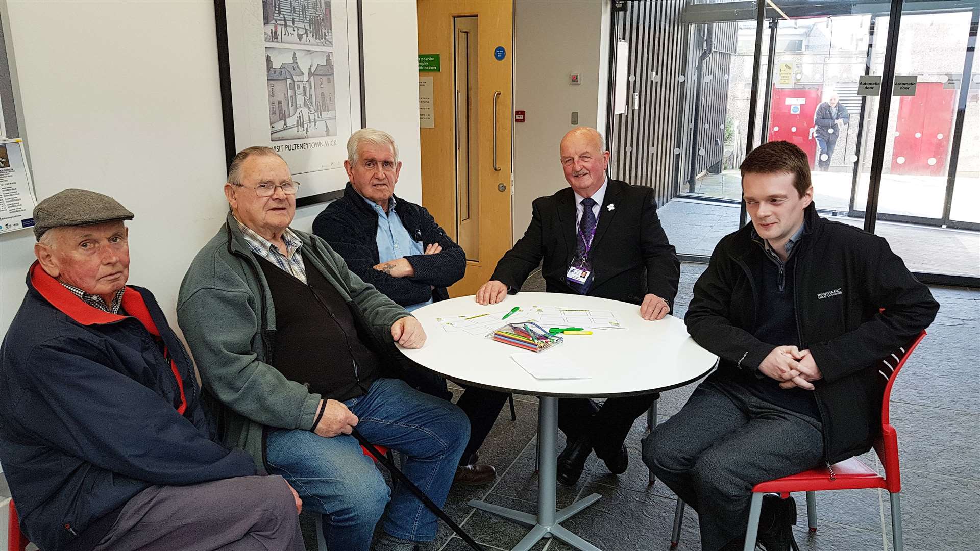 Councillors Andrew Sinclair (right) and Willie Mackay (second from right) with members of the public at the street design session in Caithness House on Thursday afternoon.