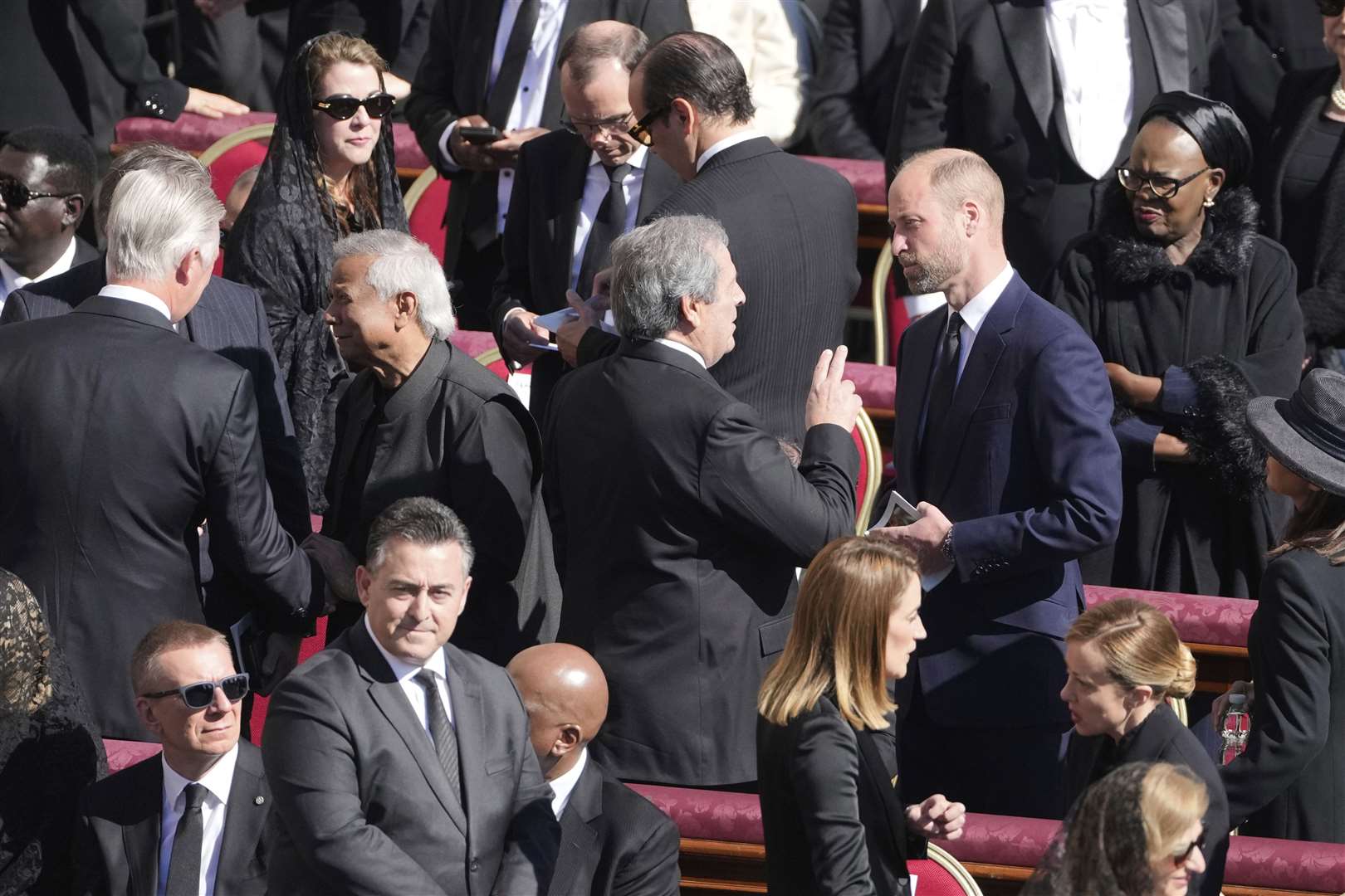 William speaks to guests as he arrives for the funeral (Markus Schreiber/AP)