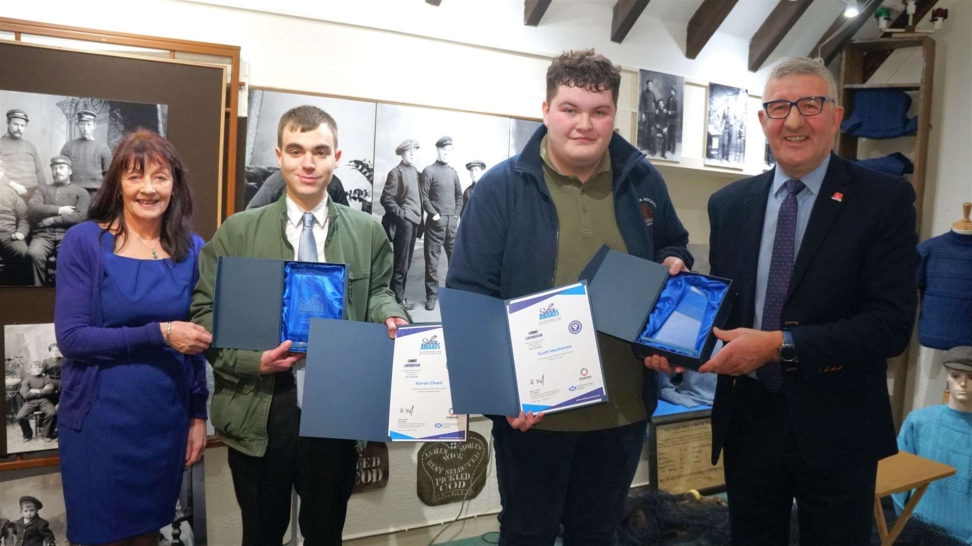 From left, Catherine Patterson from Caithness Voluntary Group, Kieran Chard and Scott Mackenzie with their awards, next to Vice Lord-Lieutenant of Caithness, Willie Watt. Picture: DGS