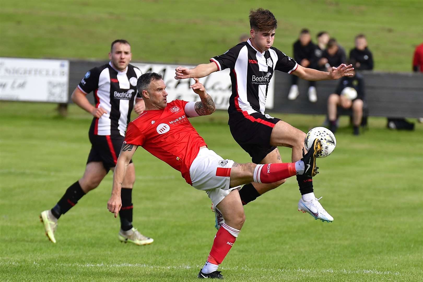 Wick Academy's Gary Pullen is challenged by Wayne Mackintosh of Nairn County during the Highland League Cup preliminary round tie at Harmsworth Park in August when Nairn won 1-0. Picture: Mel Roger