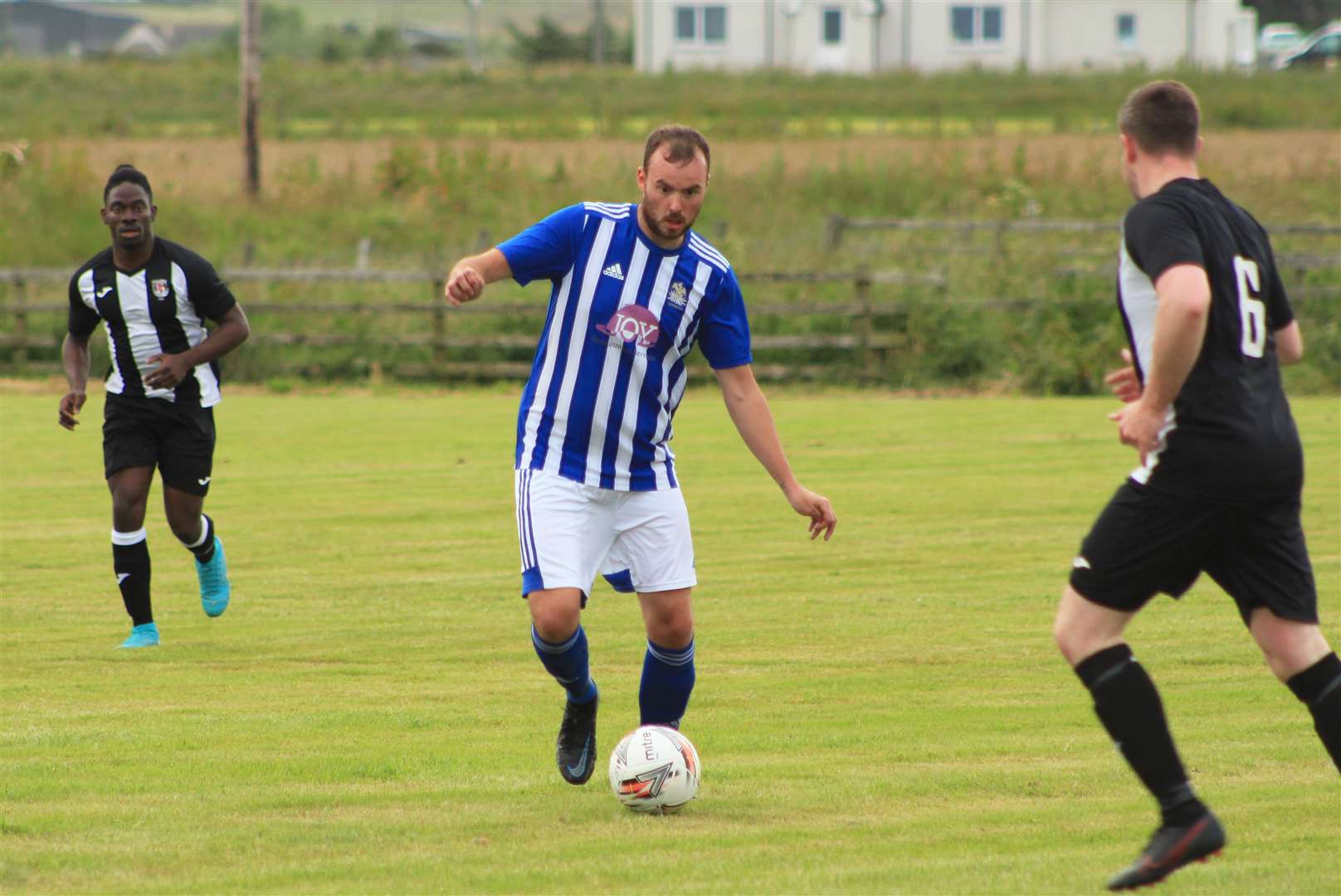 Lybster captain Gary Swanson on the ball against Swifts.