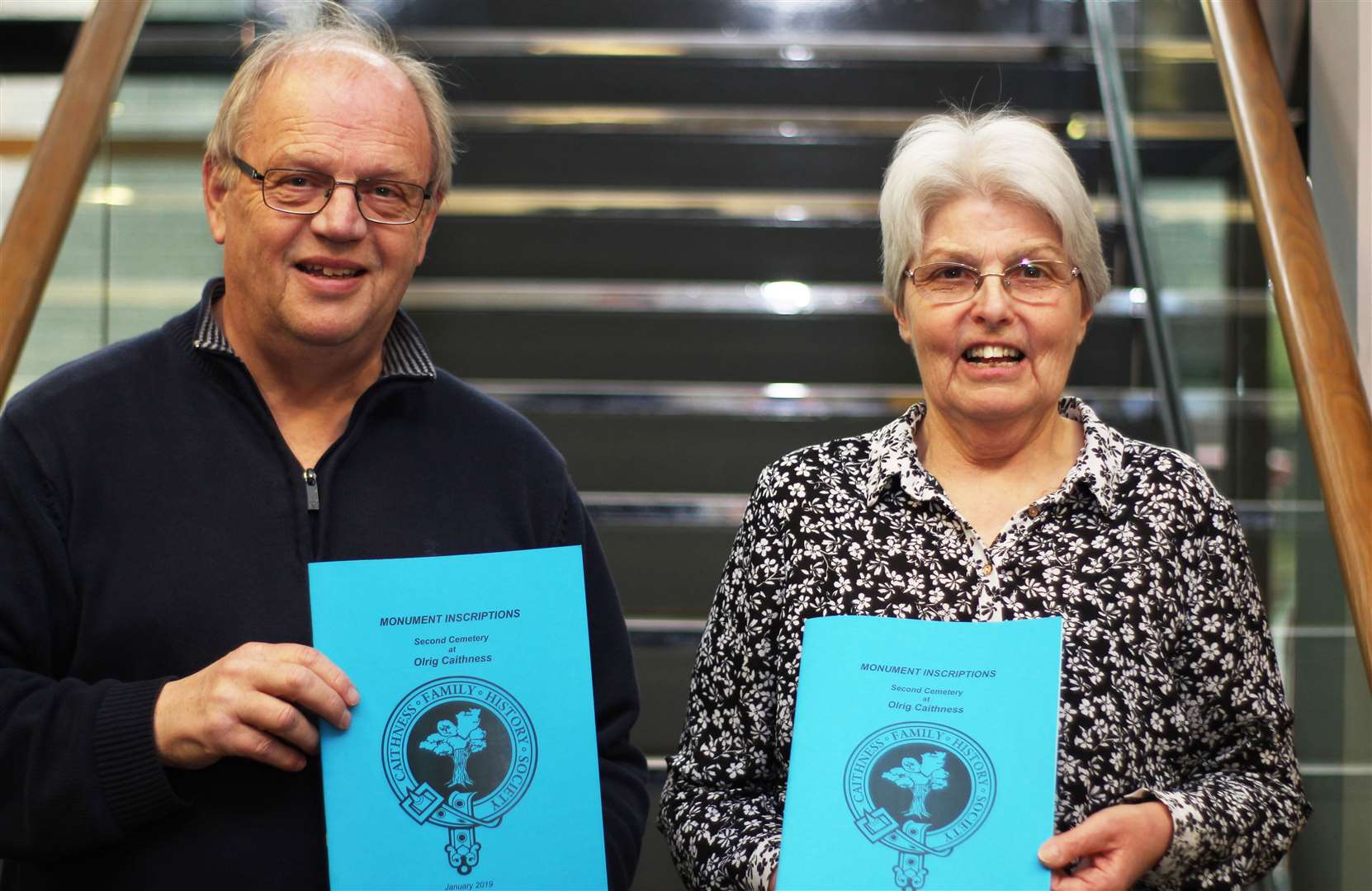 Ian Leith, vice-chairperson of Caithness Family History Society, and Anna Rogalski, the society’s publications officer, with copies of the new Olrig cemetery book at Wick's Pulteney Centre – venue for the annual conference of the Scottish Association of Family History Societies on Saturday, April 27.