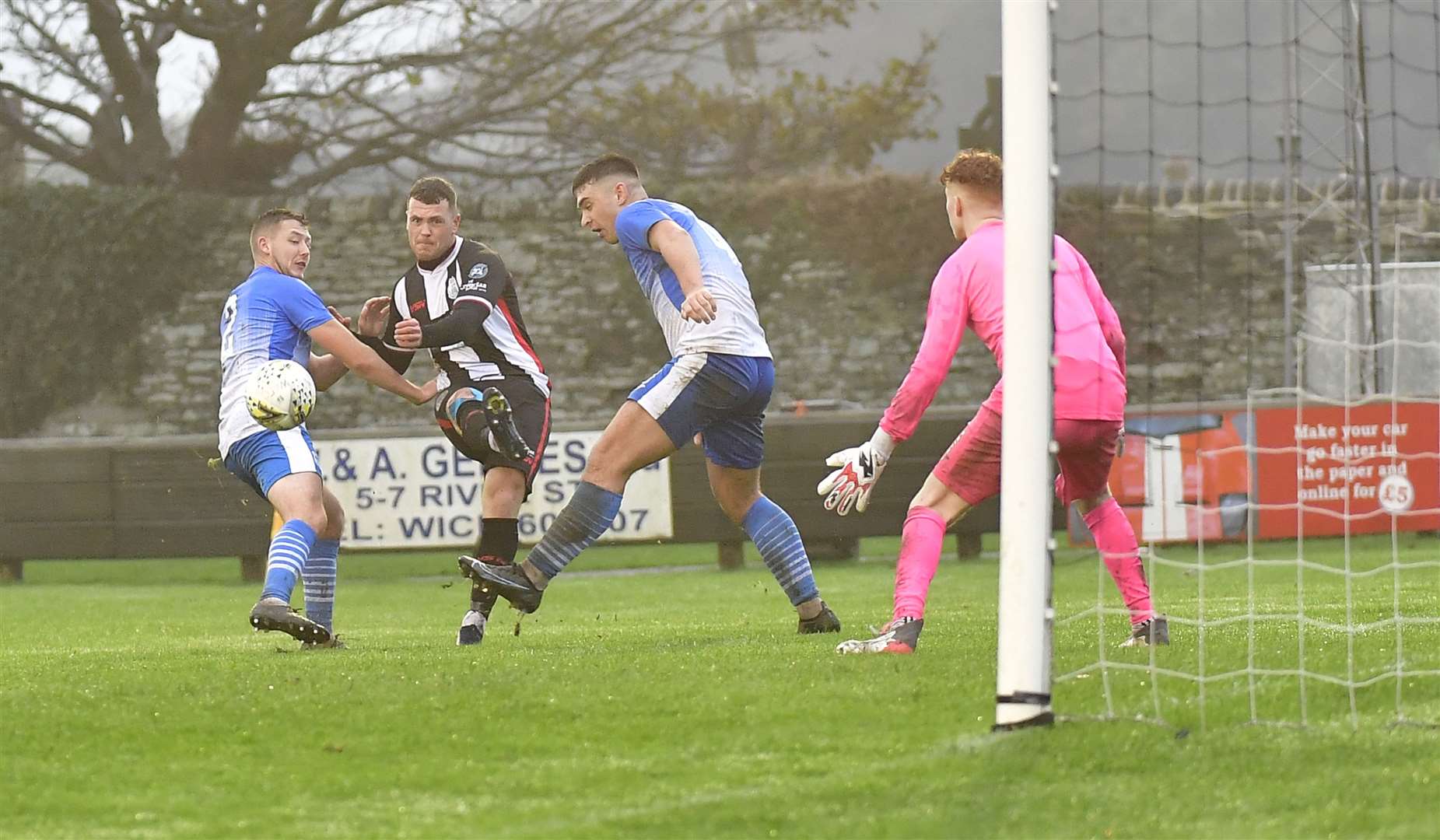 Gordon MacNab curls the ball past goalkeeper Cammy Powell to make it 2-0 and put the tie beyond Benburb's reach. Picture: Mel Roger