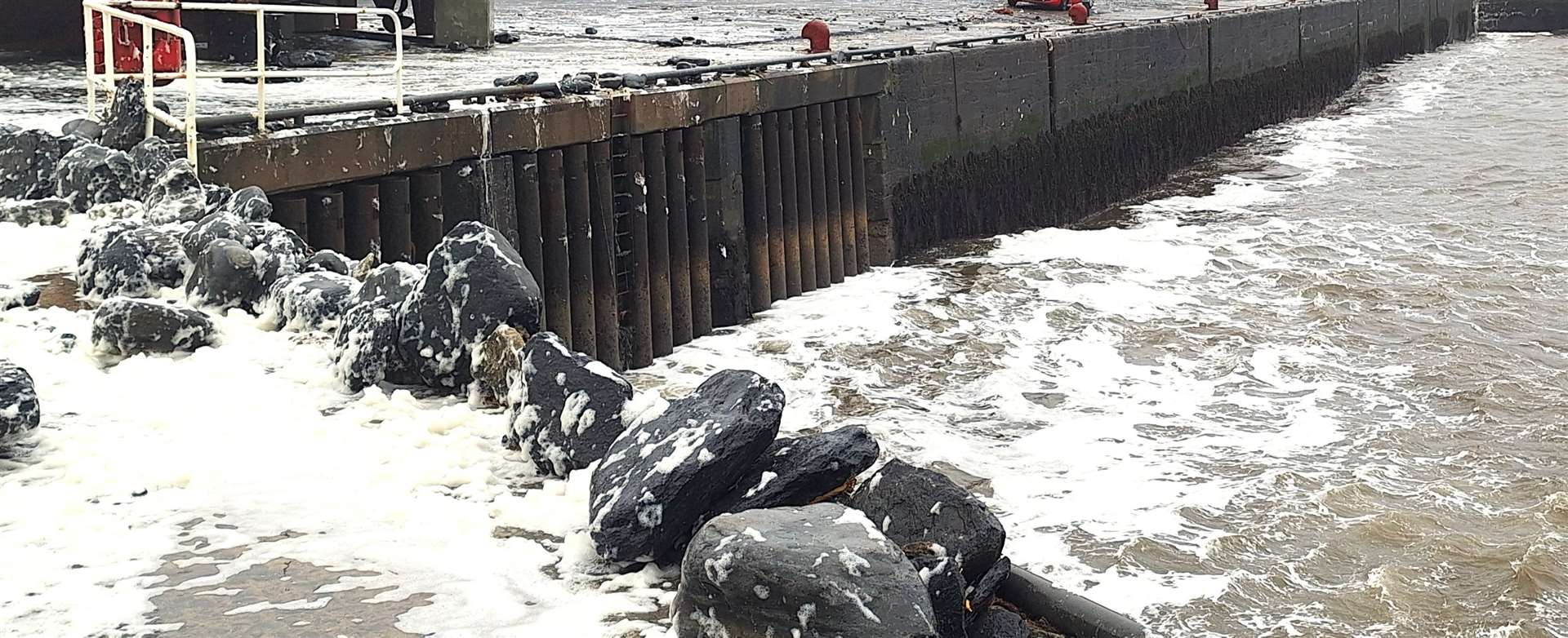 Large rocks appear to have been thrown over onto the pier at Wick harbour after the storm . Picture: DGS