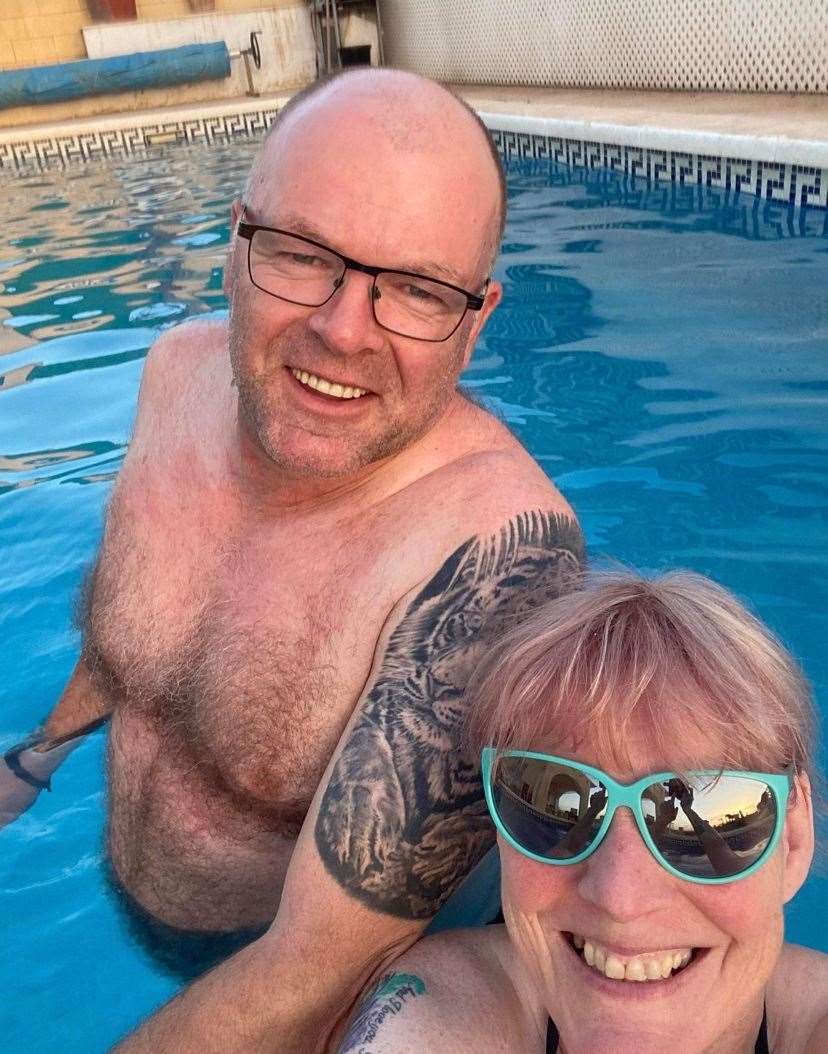 Brian and Lorna relaxing in their pool in Spain.