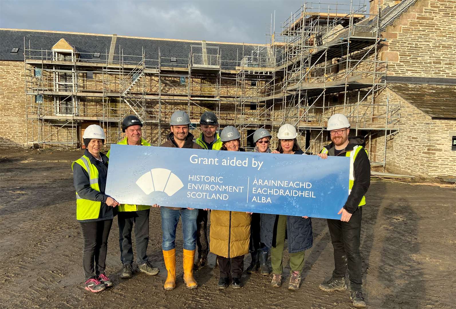 The project team at Castletown Mill (from left) Trish Bremner and Gavin Sinclair, of Norbloc Construction; Dunnet Bay Distillers co-founder Martin Murray; Jamie Rogers, Norbloc Construction; Claire Murray, co-founder; engagement manager Joanne Howdle; Andrea Wise of Organic Architects and Callum Chisholm of surveyors Morham + Brotchie.