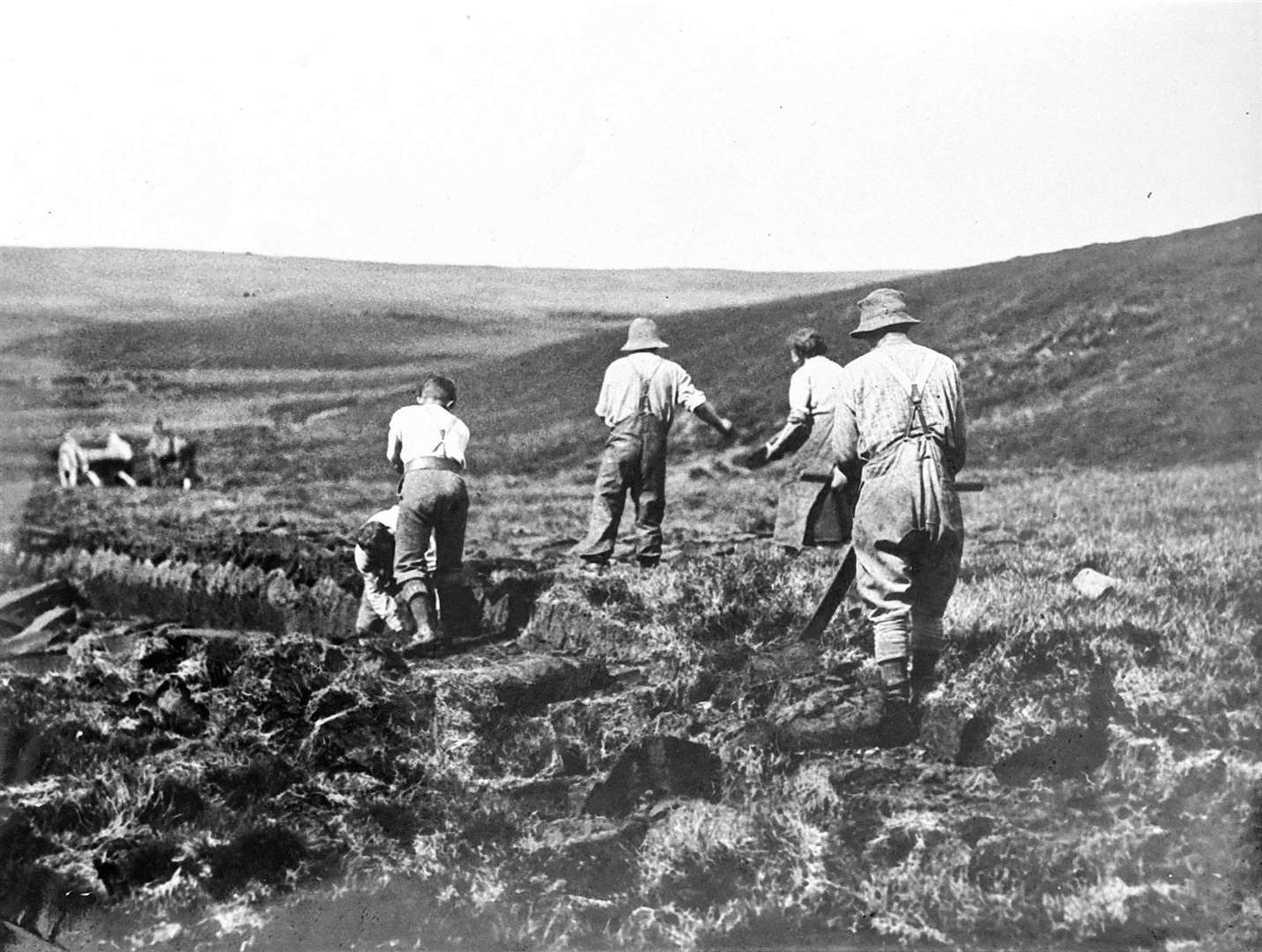 Peat-cutting in progress around 1930, a classic Caithness agricultural scene. Picture: Nucleus: The Nuclear and Caithness Archives
