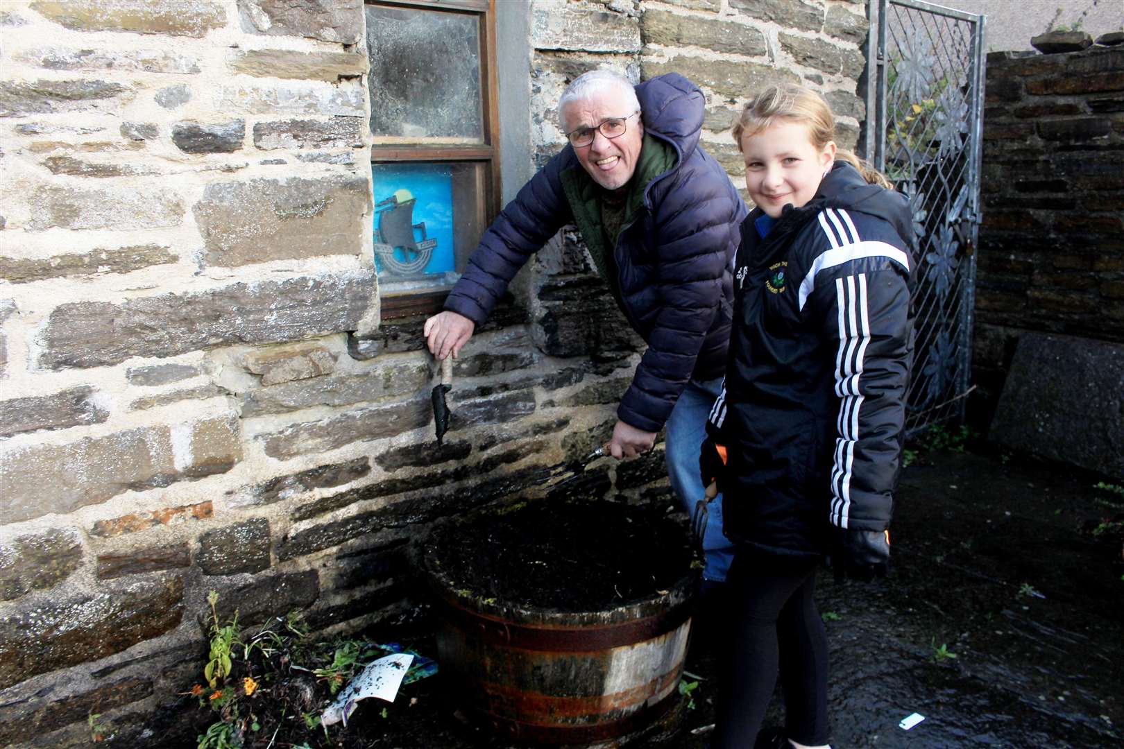 Eight-year-old Layla Bremner gave a helping alongside her grandad James Gunn, a Wick Thistle committee member.