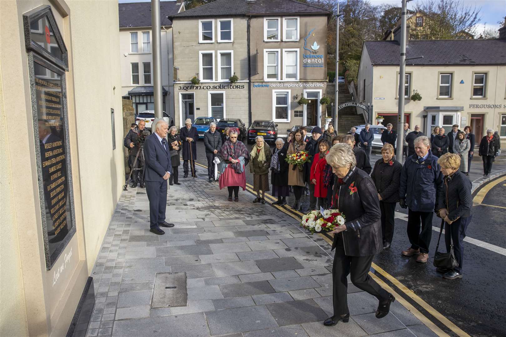 Relatives of those killed lay a wreath during an act of remembrance to mark the 35th anniversary of the Enniskillen bomb (Liam McBurney/PA)