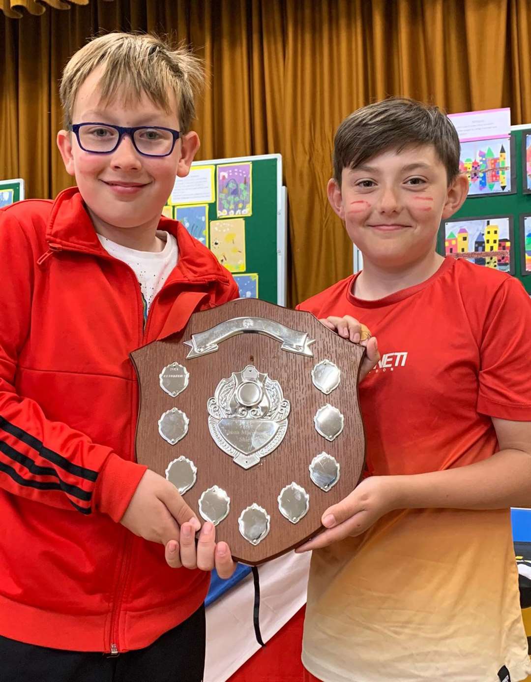 Fulliegeos house captain Callum Booth and vice-captain Jack Richard with the Rhona MacPherson Shield as house winners of Keiss sports day.