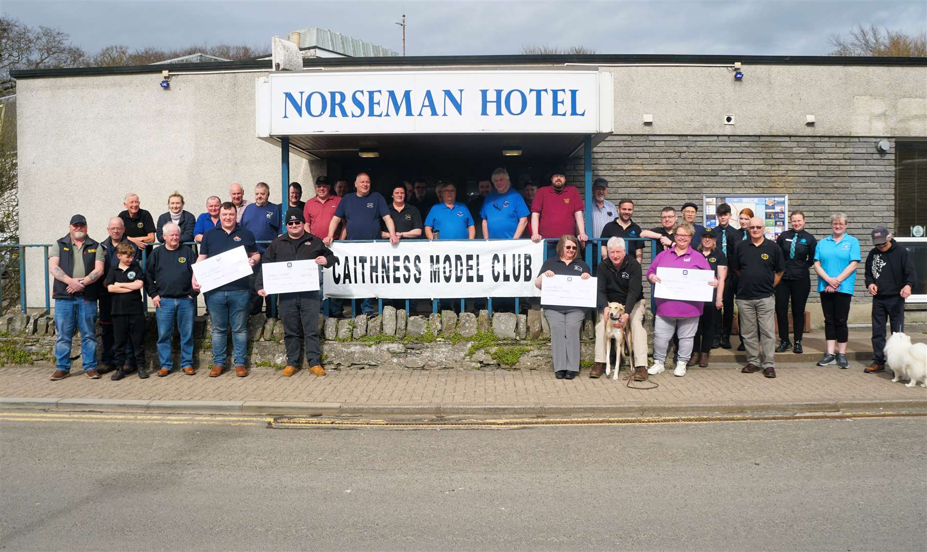 Four cheques totalling £2000 went to different charities thanks to the Caithness Model Club. Cats Protection, KWK9 Rescue, Thurso Lifeboat and Wick Lifeboat received £500 each at the handover outside the Norseman Hotel in Wick. Picture: DGS