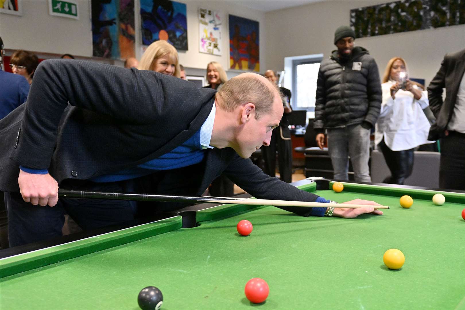 The Prince of Wales played pool during a visit to The Hideaway Youth Project in Moss Side, Manchester, in November to mark the launch of Royal Foundation Community Impact Project (Anthony Devlin/PA)