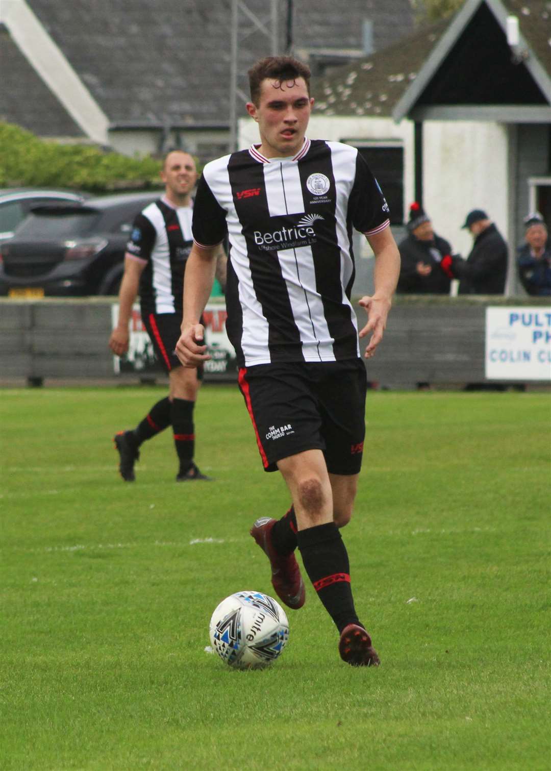 Ben Sinclair, one of the newcomers to the side, takes the ball forward for Academy.