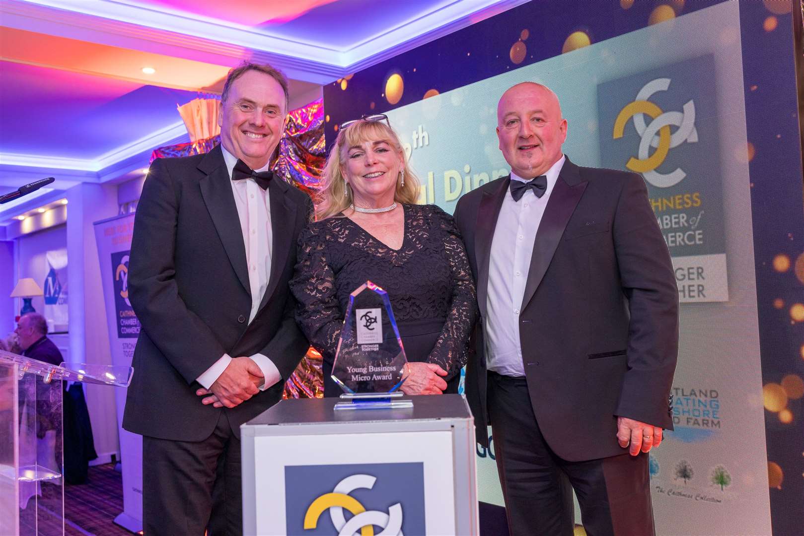 Mandy and Ged Boydell of CC Chocolatier, winners of the young business award in the Micro category, with Rob Heaton (left), of award sponsor West of Orkney Windfarm.