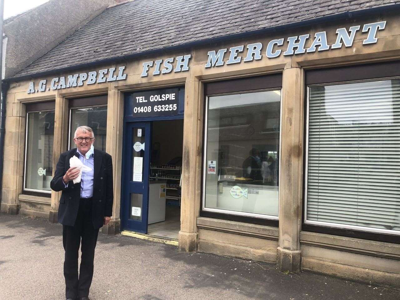 Local MP Jamie Stone visiting fish merchants A G Campbell in Golspie.