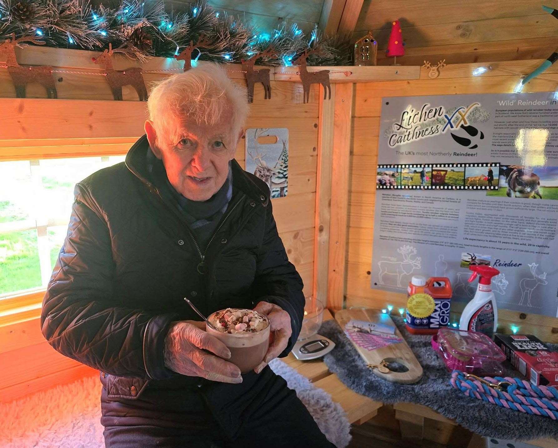 Willie Bain enjoys a large cup of hot chocolate.