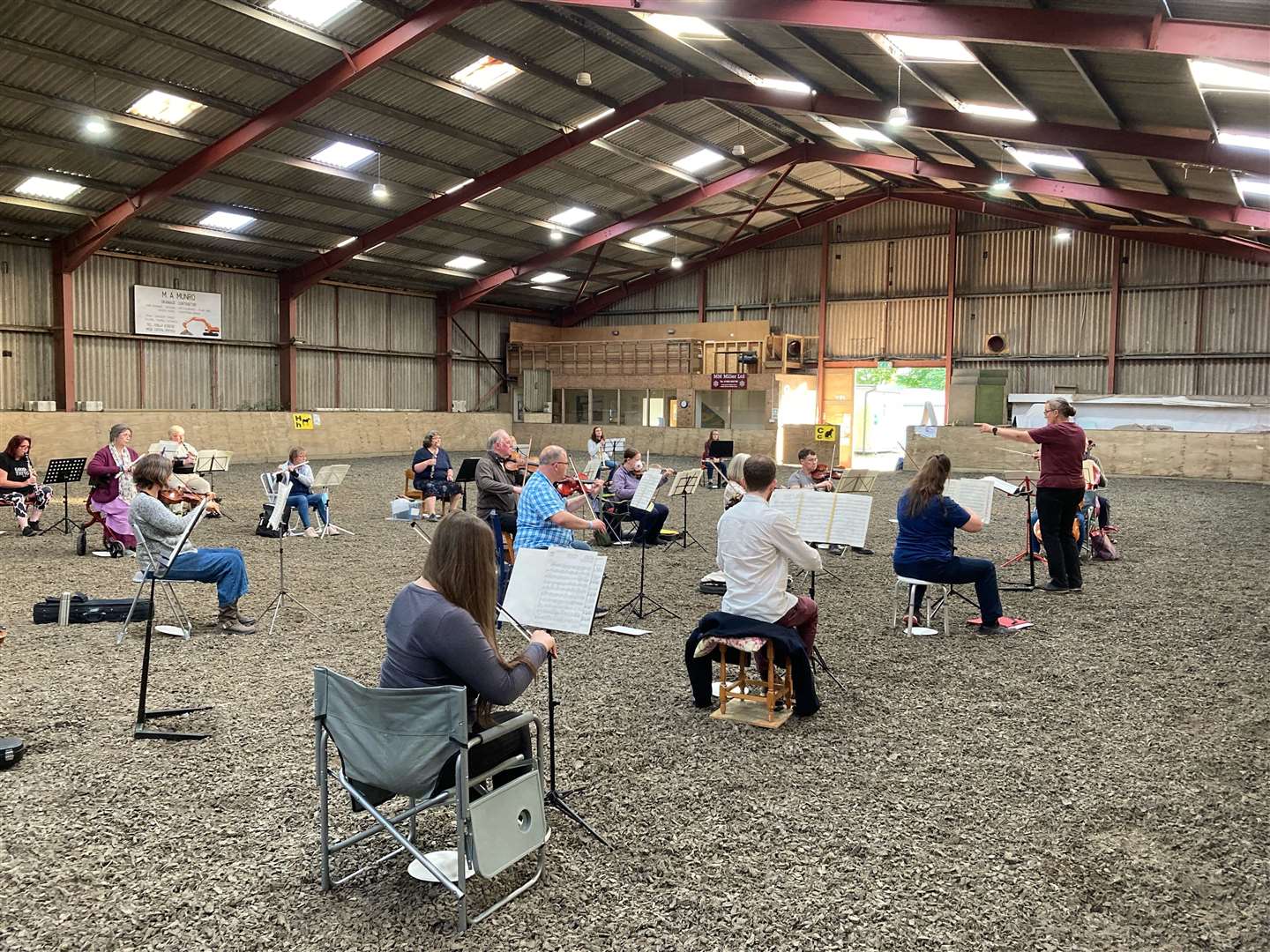 Members of the Caithness Orchestra playing in the indoor riding school at Halkirk.